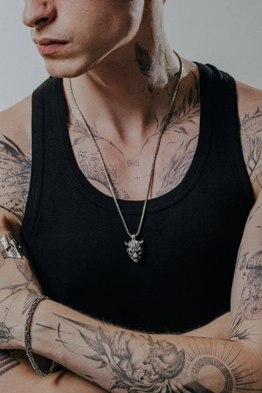 Back view of the Oni Mask Pendant showing the intricate scale pattern and the SARNION 925 hallmark.
