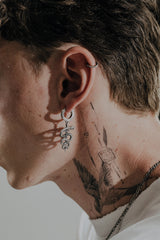 Back view of the Serpent Sword Earring's hoop, displaying the "925" hallmark and secure hinged closure.