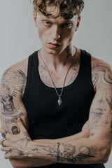 Back view of the US Marine Corps Skull Grenade Pendant, showing the solid silver construction and pin detail.