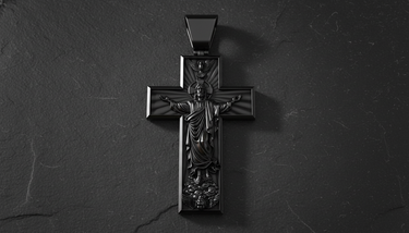 Close-up detail of Jesus ascending figure on Ascension Cross Pendant sterling silver pendant highlighting intricate sculptural work