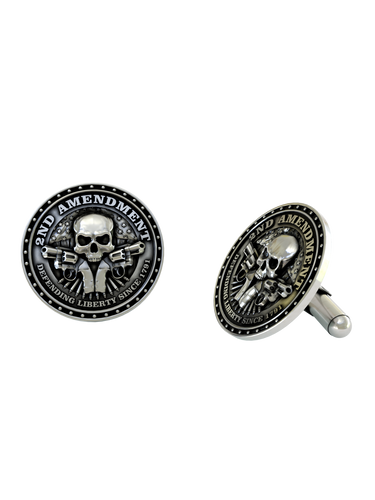 Close-up detail of a single Defending Liberty sterling silver cufflink, focusing on the skull, crossed guns, and 'Since 1791' text.