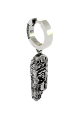 Close-up detail of the Ancient Script Earring, emphasizing the intricate hieroglyphic carvings and weathered silver finish.