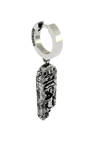 Close-up detail of the Ancient Script Earring, emphasizing the intricate hieroglyphic carvings and weathered silver finish.