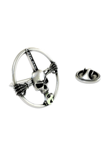 Close-up detail of the "MAD MAX" engraving and the grim skull face on the Mad Max Lapel Pin.