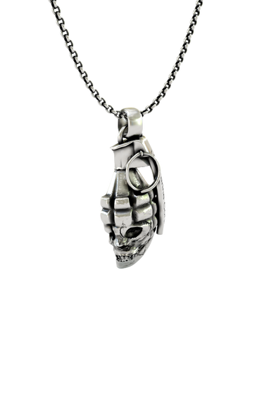 Close-up detail of the "US Marine Corps" engraving on the lever of the Skull Grenade Pendant.