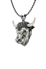 Close-up detail of the determined expression and fine craftsmanship on the Taurus Bull Zodiac Pendant.