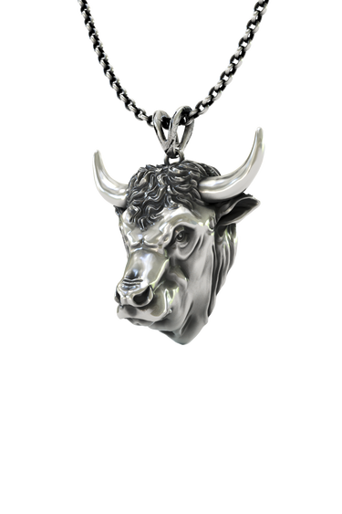 Close-up detail of the determined expression and fine craftsmanship on the Taurus Bull Zodiac Pendant.