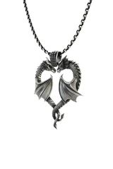 Close-up detail of the dragon heads and the textured, scale-patterned bail on the Dragon Love Pendant.