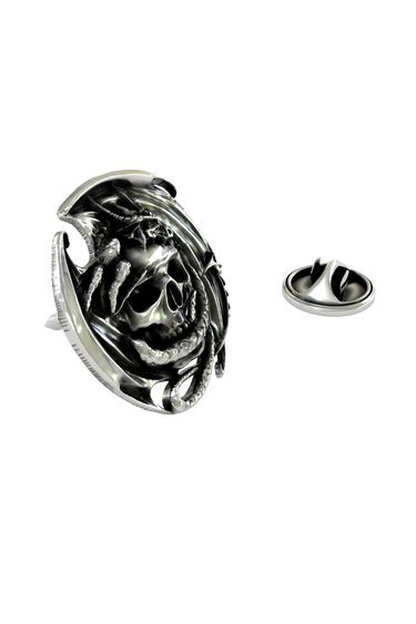 Close-up detail of the dragon's head and the menacing skull on the Skull and Dragon Lapel Pin.