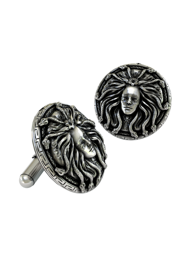 Close-up detail of the expressive face and serpents on the Medusa sterling silver cufflinks, showcasing the intricate engraving.