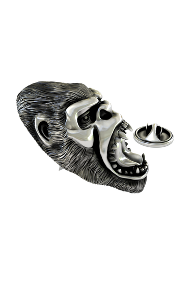 Close-up detail of the intense expression and textured fur on the Silver Gorilla Lapel Pin.
