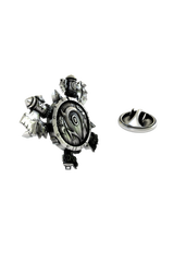 Close-up detail of the intricate carvings on the Viking Shield Lapel Pin, showcasing its rugged texture.