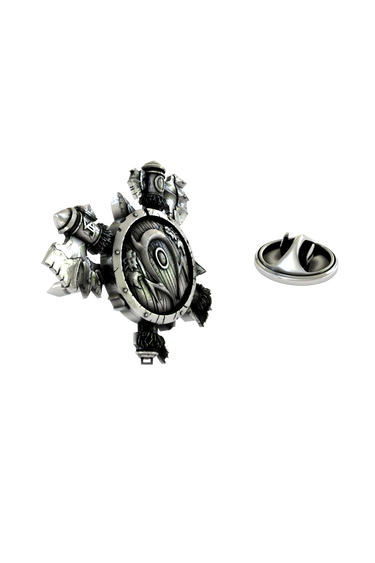 Close-up detail of the intricate carvings on the Viking Shield Lapel Pin, showcasing its rugged texture.
