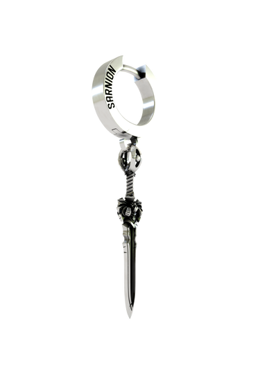 Close-up detail of the intricate demon skull guard on the Gothic Sword Earring, emphasizing the dark, oxidized finish