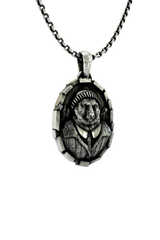 Close-up detail of the intricate fur and fabric textures on the Gentleman Bear Pendant, showing the fine craftsmanship.