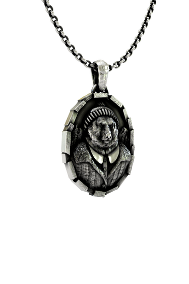 Close-up detail of the intricate fur and fabric textures on the Gentleman Bear Pendant, showing the fine craftsmanship.