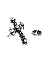 Close-up detail of the intricate, individual skulls that form the Gothic Skull Cross Pin.