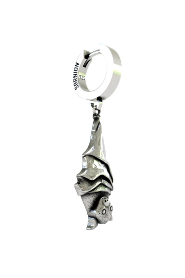 Close-up detail of the intricately sculpted face on the Hanging Bat Earring, showing the fine sterling silver craftsmanship