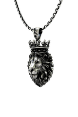 Close-up detail of the majestic expression and fine craftsmanship on the Crowned King lion pendant.