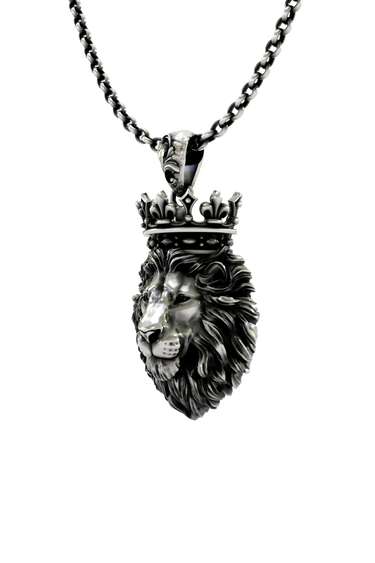 Close-up detail of the majestic expression and fine craftsmanship on the Crowned King lion pendant.