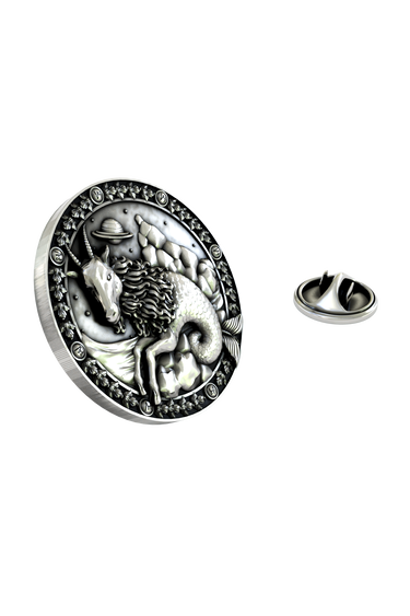 Close-up detail of the mythological Sea-Goat and celestial background on the Capricorn Zodiac Pin.
