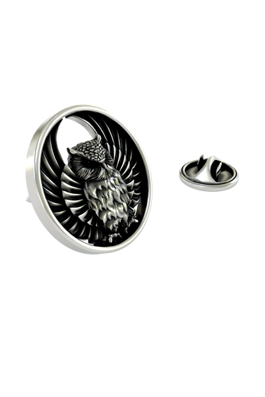 Close-up detail of the owl's face on the Artisan Owl Pin, highlighting the textured sterling silver finish
