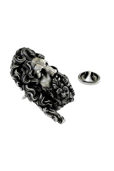 Close-up detail of the powerful expression and flowing beard on the Silver Zeus Lapel Pin.