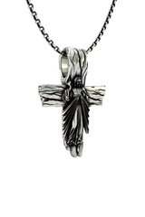 Close-up detail of the radiating robes and blessing gesture of Christ on the Sacred Cross Pendant.