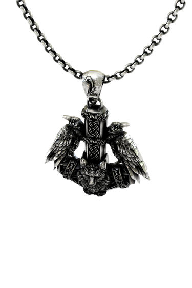 Close-up detail of the raven, wolf, and knotwork on the Huginn and Muninn Mjolnir Pendant, showing the fine craftsmanship.