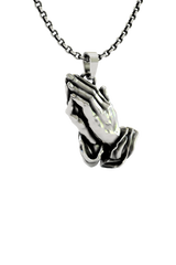 Close-up detail of the snarling fangs and intricate forehead design on the Oni Mask Pendant.