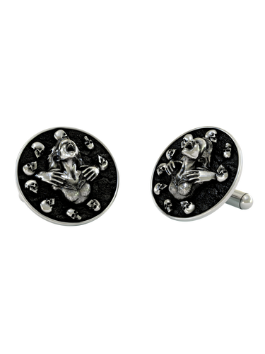 Death's Embrace 925 sterling silver cufflinks - angled pair view of the screaming soul figure surrounded by floating skulls.
