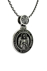 Divine Protection Pendant shown on a model to demonstrate its size and traditional Orthodox style.