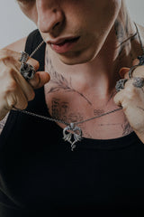 Dragon Love Pendant in 925 sterling silver worn as a unique symbol of eternal, powerful love.