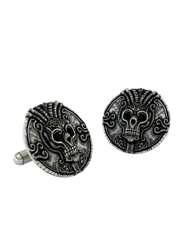 Dynamic shot of the Aztec Skull 925 silver cufflinks pair, emphasizing the detailed filigree and the powerful design of the headdress.