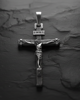 Front centered view of INRI Crucifix Pendant 925 silver cross with Jesus corpus and sacred inscription