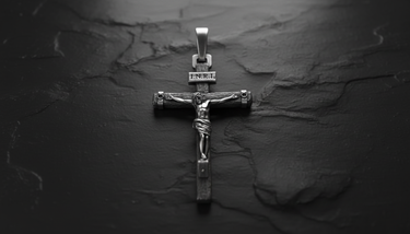 Front centered view of INRI Crucifix Pendant 925 silver cross with Jesus corpus and sacred inscription