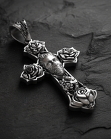 Front view of Chicano Rose Crucifix sterling silver pendant featuring tattoo-style roses at cross terminals with Gothic Jesus figure