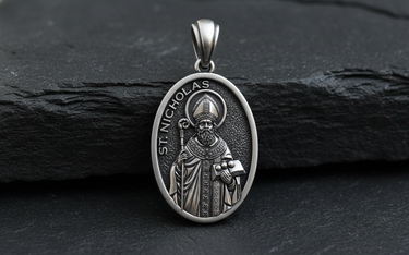 Front view of Saint Nicholas Medal Pendant sterling silver pendant displaying bishop in ornate vestments holding Gospel book