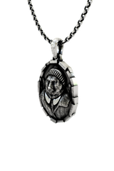 Gentleman Bear Pendant in 925 sterling silver worn as a charming and unique piece of whimsical jewelry.