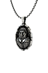 Gentleman Bear Pendant shown on a model to demonstrate its size and wearability as a character necklace.