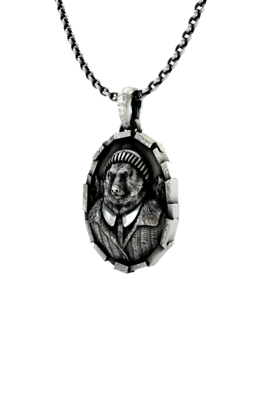 Gentleman Bear Pendant shown on a model to demonstrate its size and wearability as a character necklace.