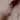 Hanging Bat Earring in 925 sterling silver - front view showcasing the detailed face and polished, wrapped wings
