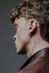 Hanging Bat Earring shown with a size reference to demonstrate its actual dimensions and drop length when worn