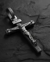 INRI Crucifix Pendant sterling silver cross shown with chain on white background demonstrating wearable size