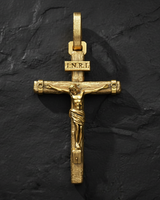 INRI Crucifix Pendant sterling silver cross with reflection showing polished and oxidized finish contrast