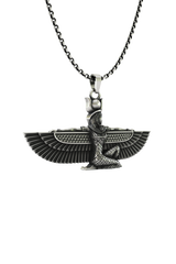 Isis Wings Pendant shown on a model to demonstrate its size and how it wears as a powerful statement necklace.