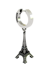 Macro close-up shot of the Parisian Tower Earring, focusing on the intricate lattice work of the famous French tower.