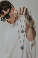 Memento Mori Cancer Pendant in 925 sterling silver worn as a piece of meaningful zodiac and philosophical jewelry.