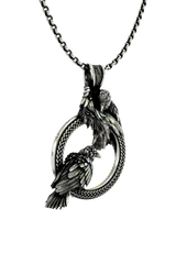 Odin Ravens Pendant shown on a model to demonstrate its size and wearability as a powerful Norse amulet.