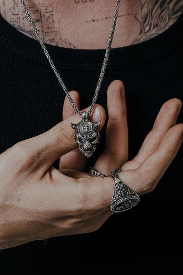 Oni Mask Pendant in 925 sterling silver worn as a bold piece of Japanese-inspired biker and fantasy jewelry.